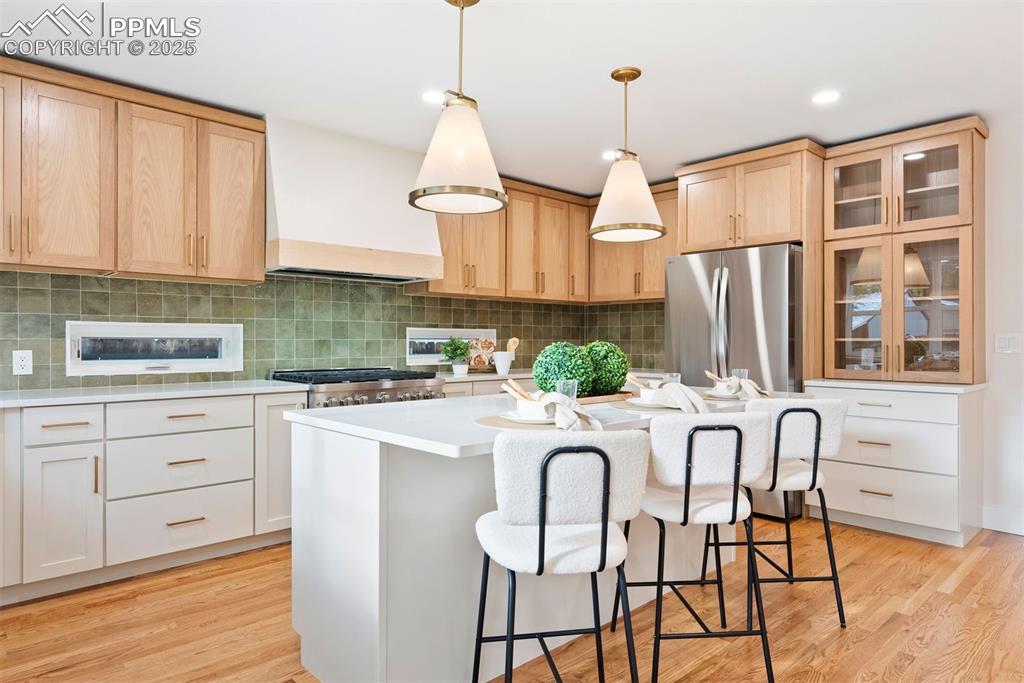 Image 3 of 39: Gorgeous kitchen! Ample storage space with soft close cabinetry and a large