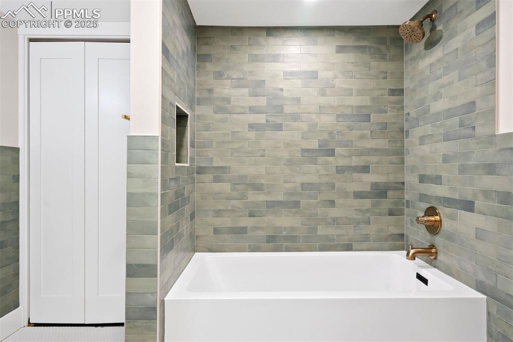 Image 31 of 39: Basement bathroom.