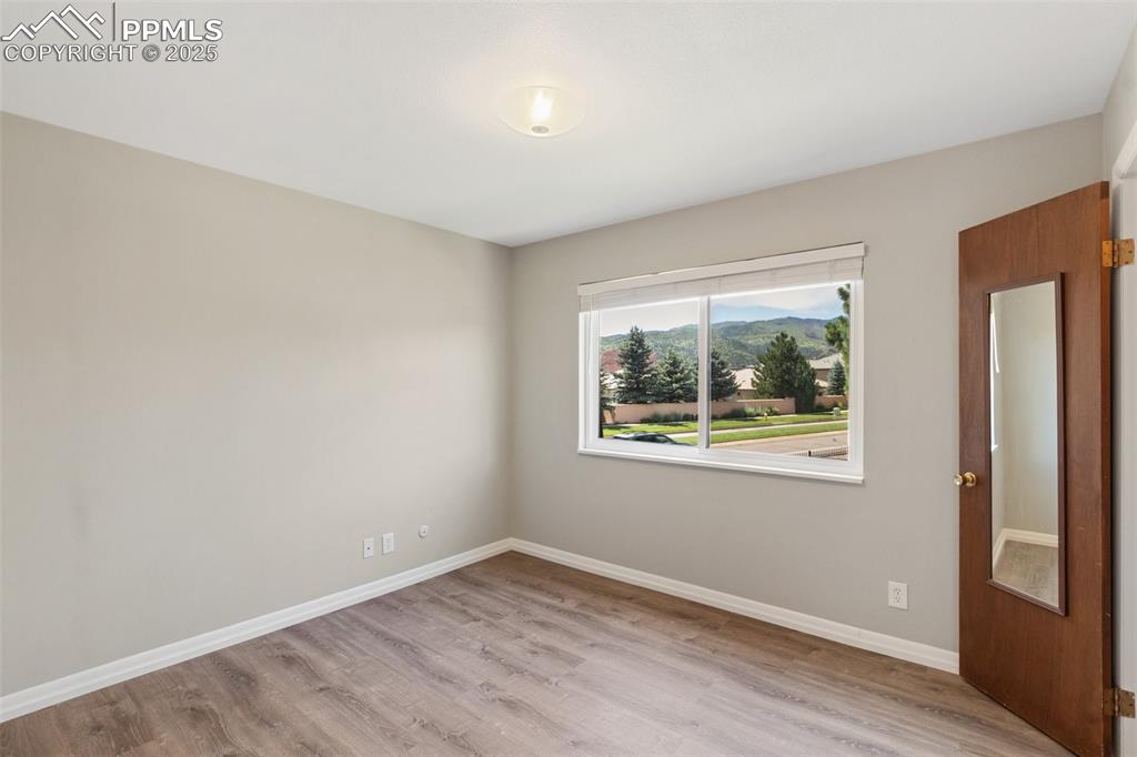 Image 29 of 48: 2nd Bedroom featuring light wood-style floors