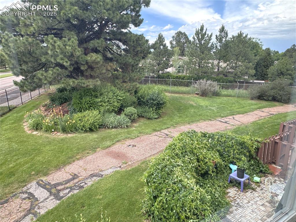 Image 35 of 48: View of yard from Balcony