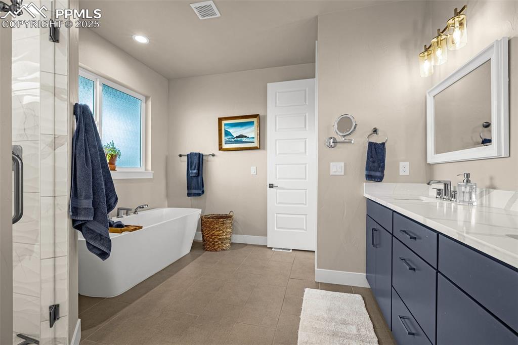 Image 20 of 50: Master Bathroom