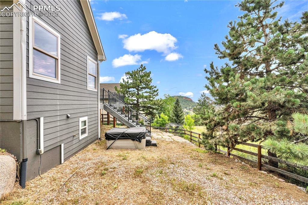Image 24 of 29: View of yard with stairs and a mountain view