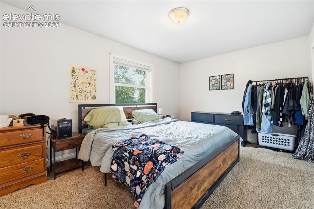 Image 13 of 46: Upstairs unit primary bedroom