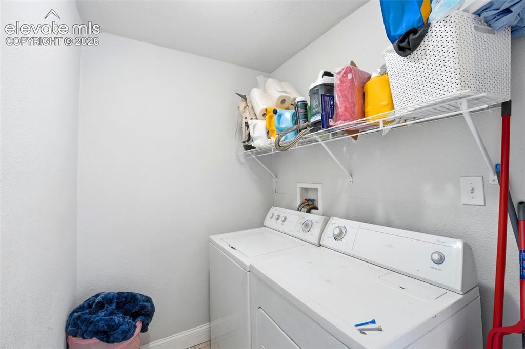 Image 18 of 46: Upstairs unit laundry