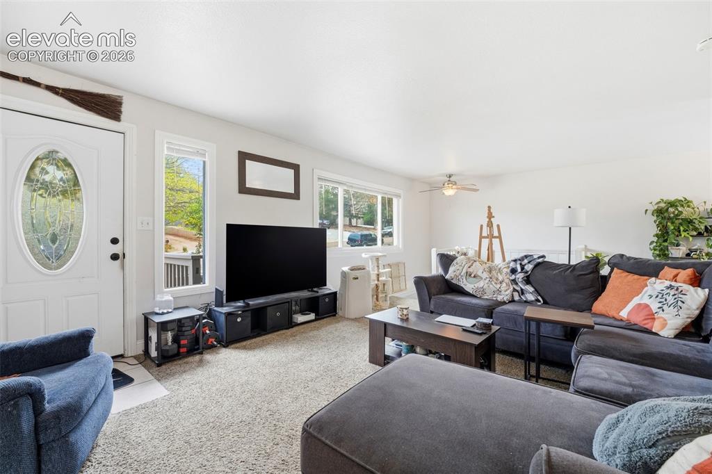 Image 5 of 46: Upstairs unit living room