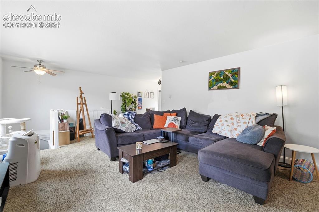 Image 6 of 46: Upstairs unit living room