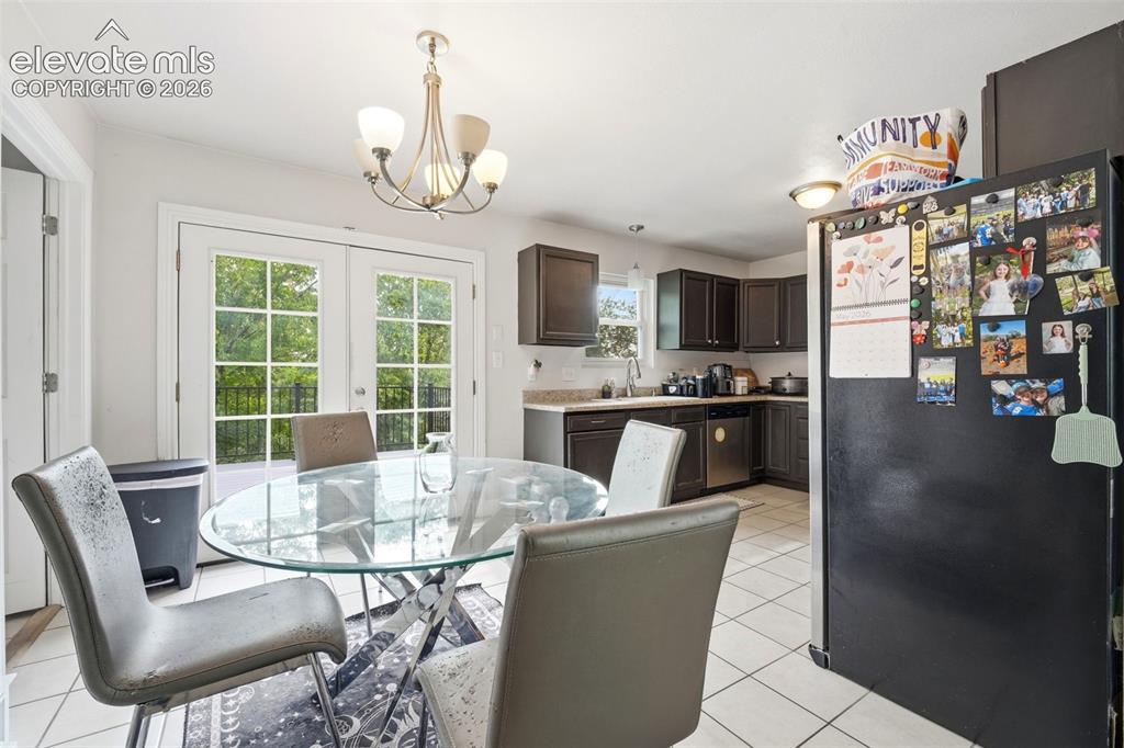 Image 8 of 46: Upstairs unit dining area