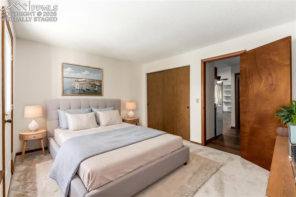 Image 11 of 25: Close-up of the fireplace showcasing rustic stone detail and charming chara