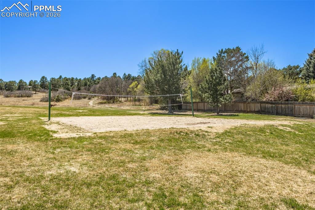 Image 22 of 25: Stunning mountain views provide a picturesque backdrop to the neighborhood,