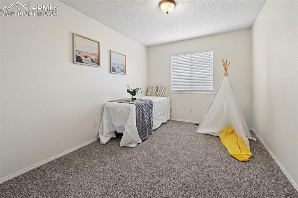 Image 12 of 33: Bedroom