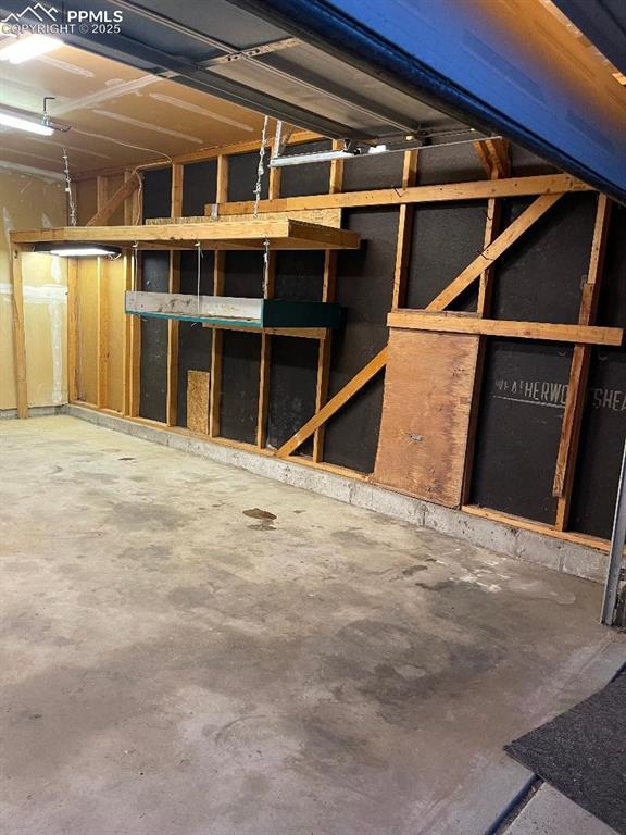 Image 11 of 11: INSIDE OF TWO CAR GARAGE.