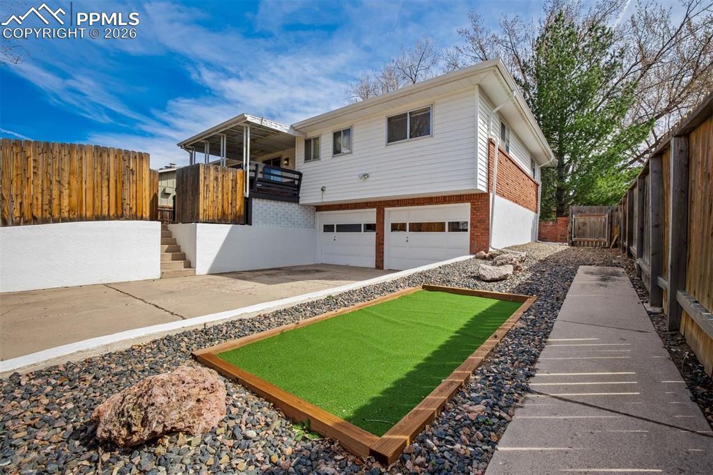 Image 36 of 37: 2 car garage with apple parking off the alley
