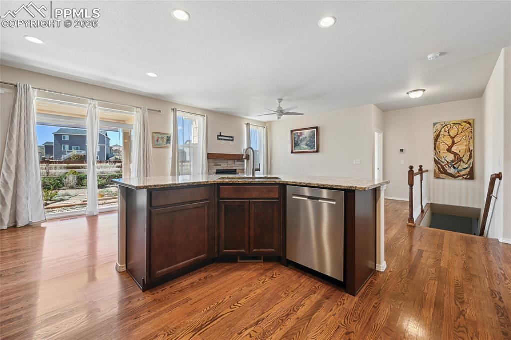 Image 10 of 37: You can enjoy your family, your guests, and your flower-filled back yard as