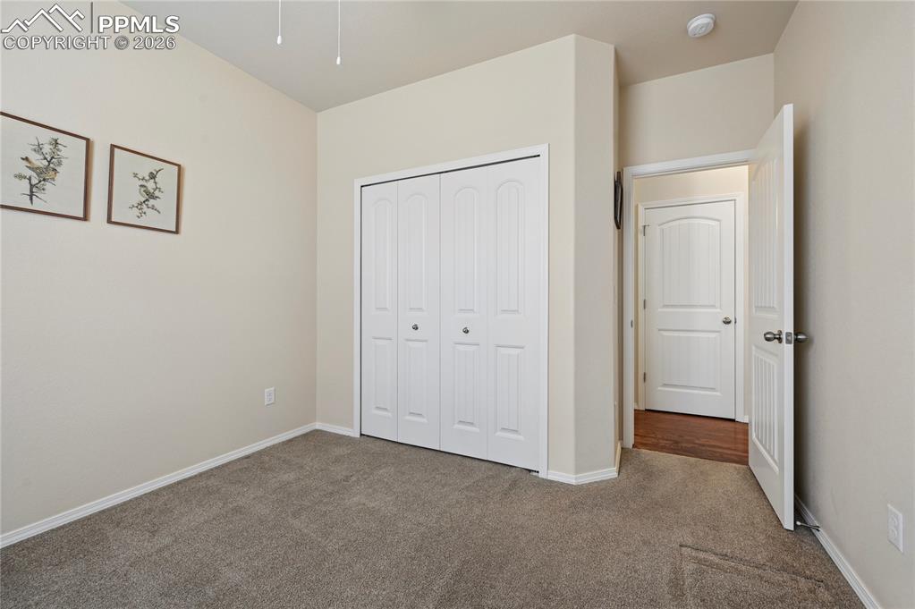 Image 16 of 37: Bedroom #2 of 4 has a good-sized double-door closet, and its own full bathr