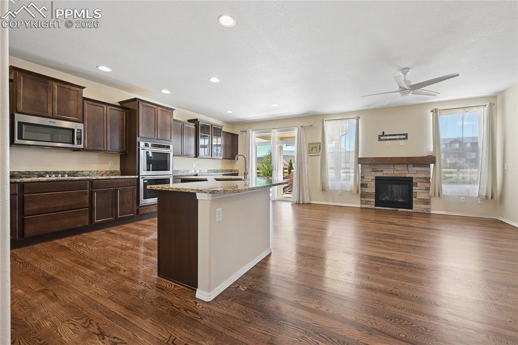 Image 4 of 37: The great room features that wonderful open concept, and is adorned wall-to