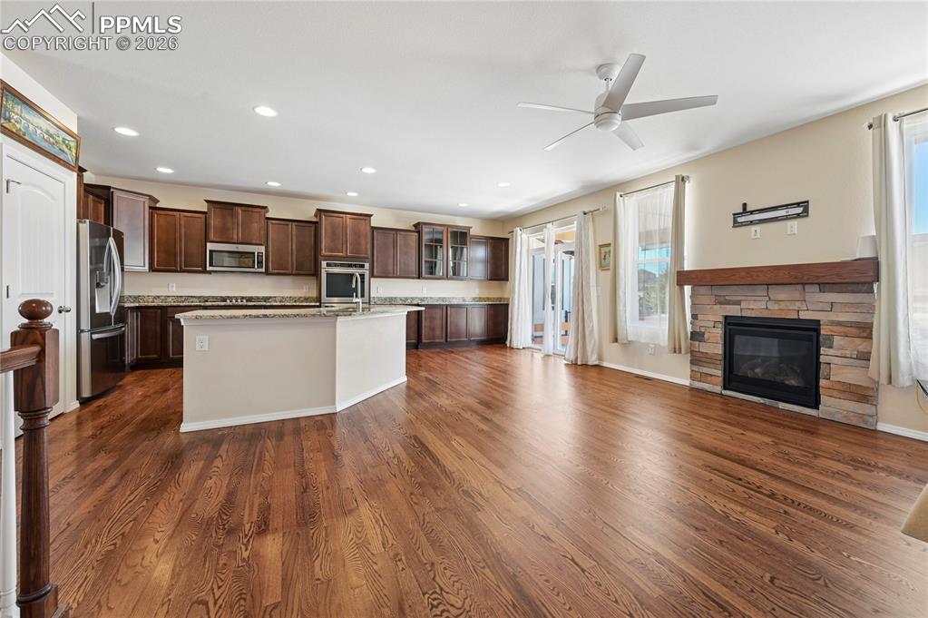 Image 6 of 37: The upgrades in this home are fantastic, including wall-to-wall custom cabi