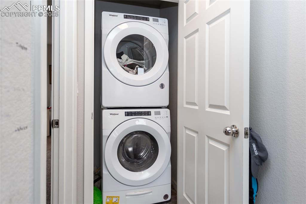 Image 41 of 48: Laundry next to primary bedroom
