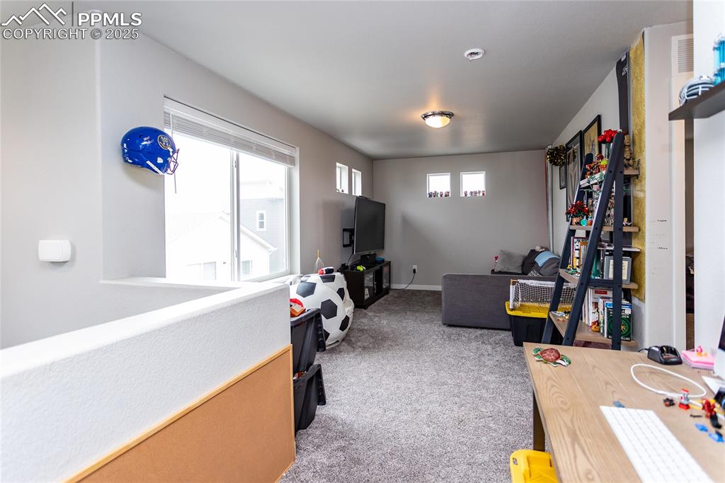 Image 44 of 48: spacious loft room on the third level