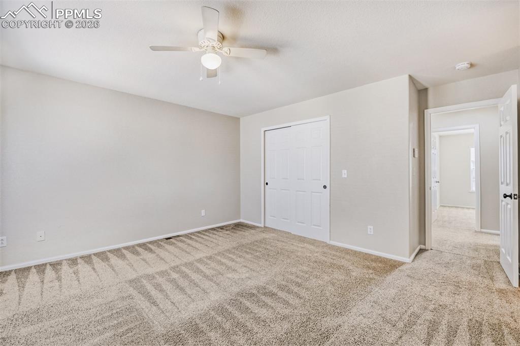 Image 17 of 28: Bathroom featuring vanity and light tile patterned flooring