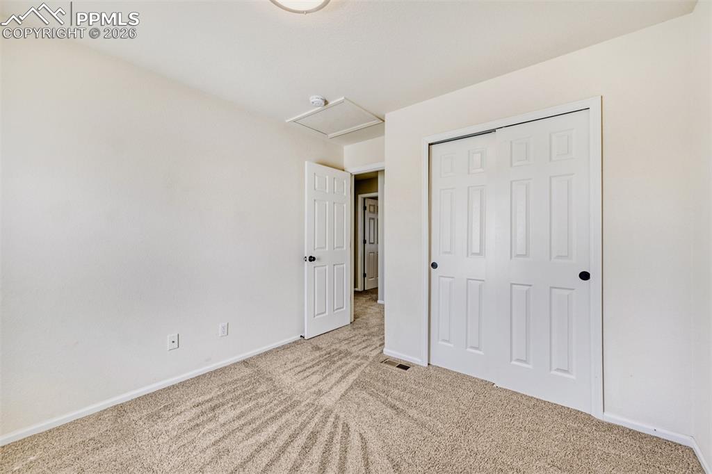 Image 19 of 28: Upper secondary bedroom.