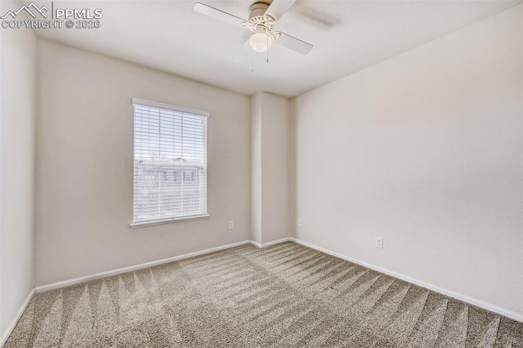 Image 20 of 28: Upper third bedroom.