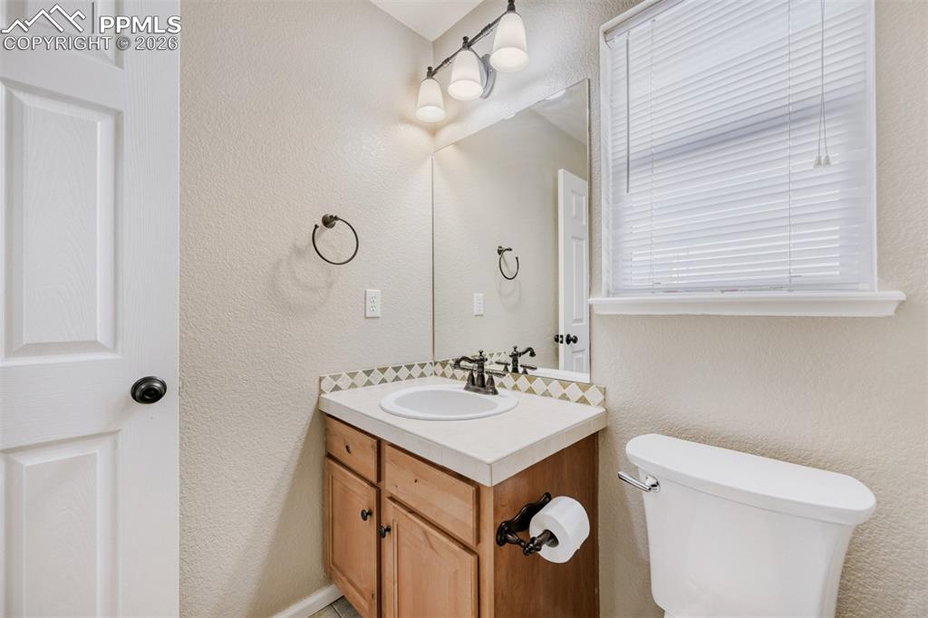 Image 21 of 28: Upper third bedroom.