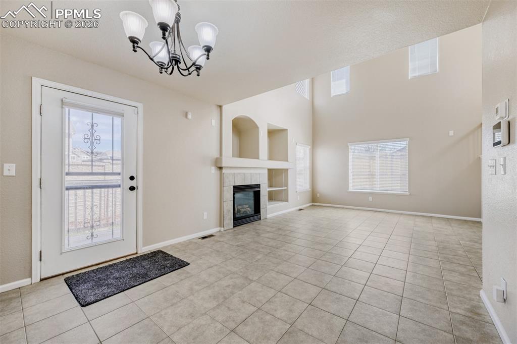 Image 3 of 28: Property entrance with covered porch is perfect for morning coffee.