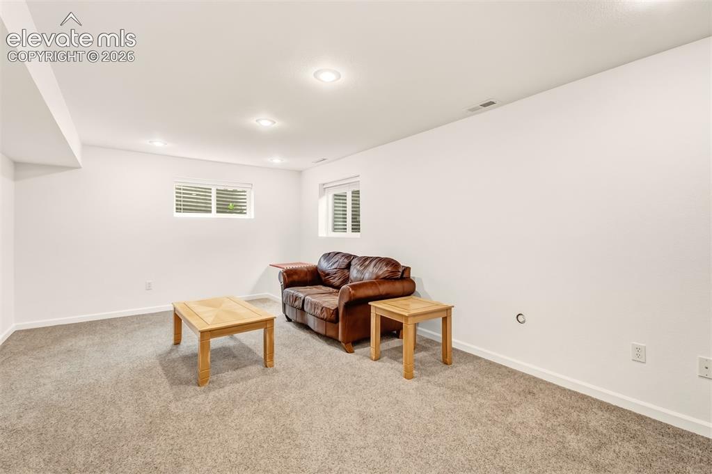 Image 28 of 39: Recreation room in basement