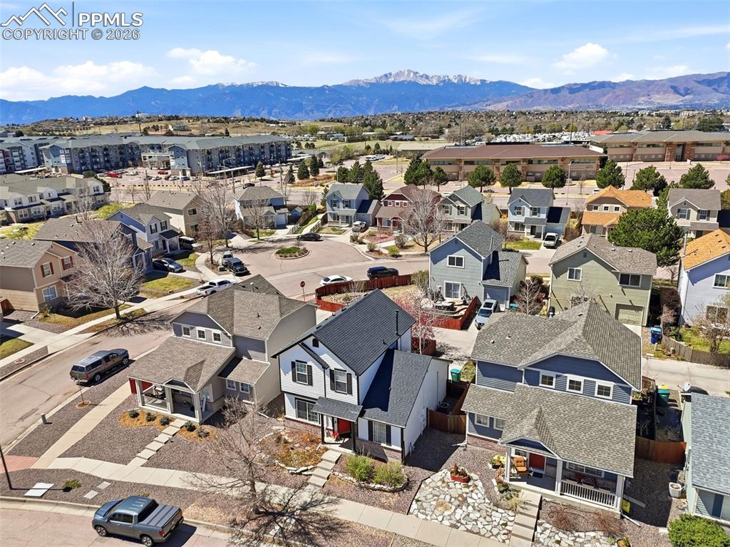 Image 40 of 44: Residential neighborhood featuring varied architectural styles and mountain