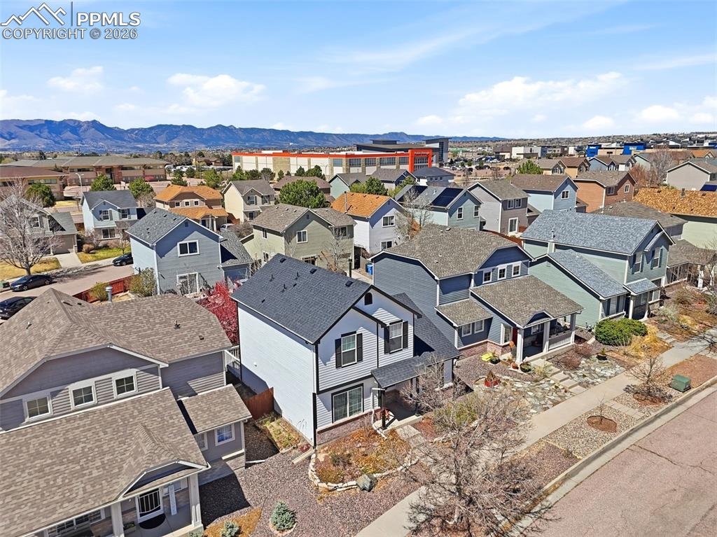 Image 42 of 44: Residential community with a variety of architectural styles, shingle roofs