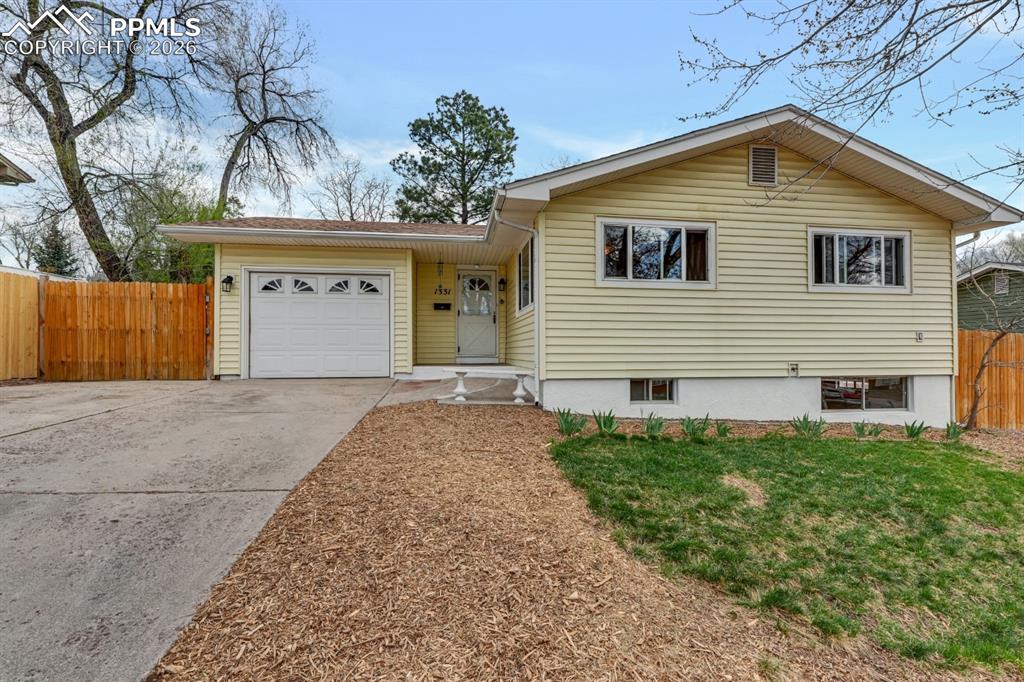 Image 1 of 25: Attached garage and oversized driveway