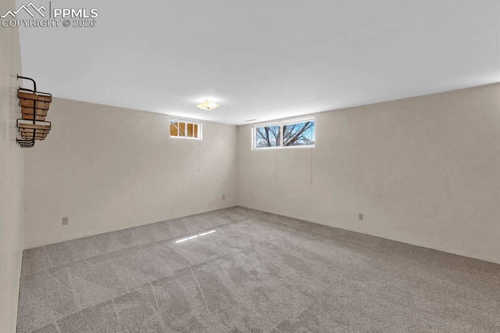 Image 17 of 25: Garden Level basement family room