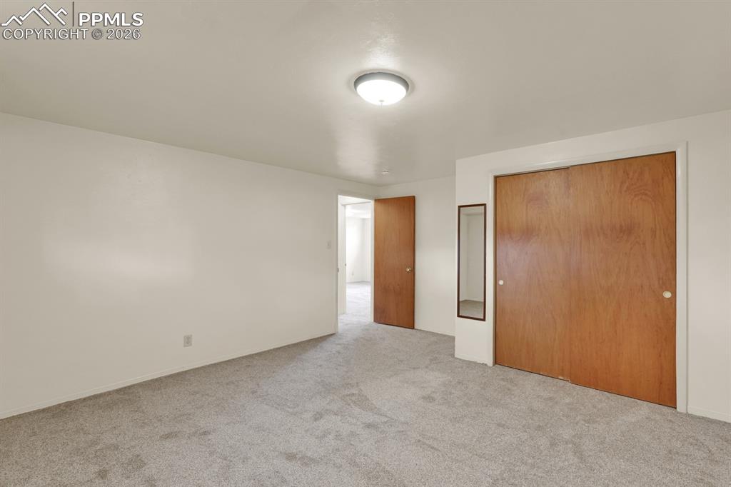 Image 19 of 25: Basement bedroom 