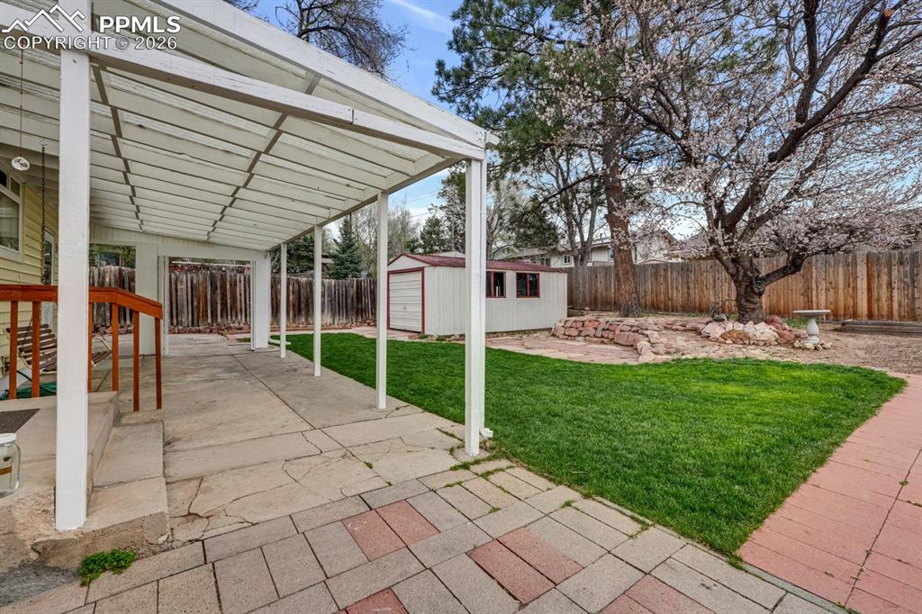 Image 22 of 25: Covered patio