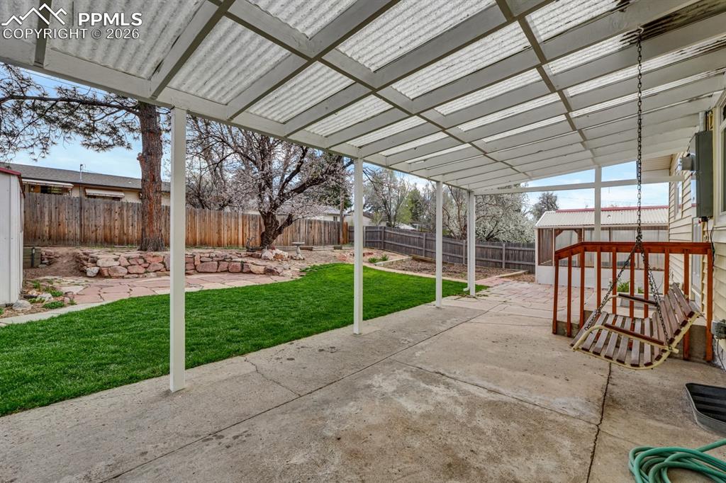 Image 3 of 25: Covered patio