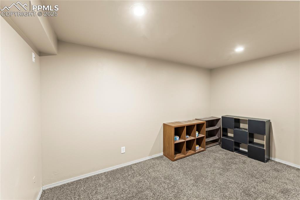 Image 21 of 38: Basement bedroom