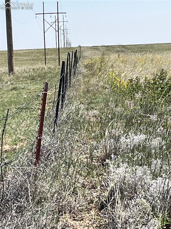 Image 3 of 5: View of yard featuring a view of rural / pastoral area