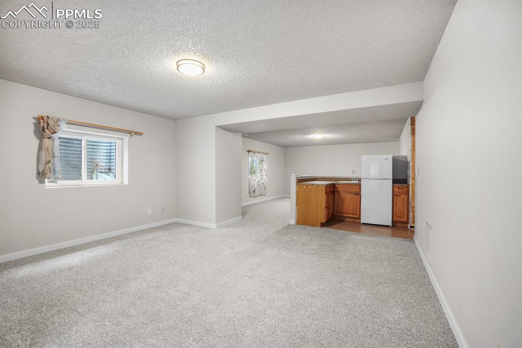 Image 30 of 44: Basement Living Room