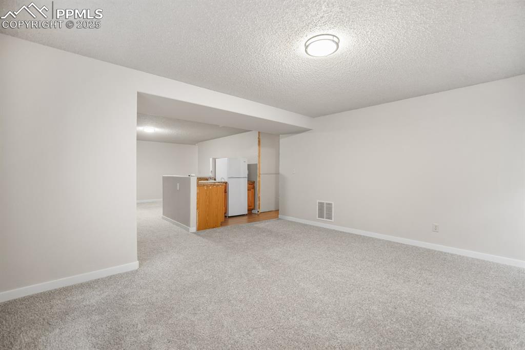 Image 31 of 44: Basement Family Room