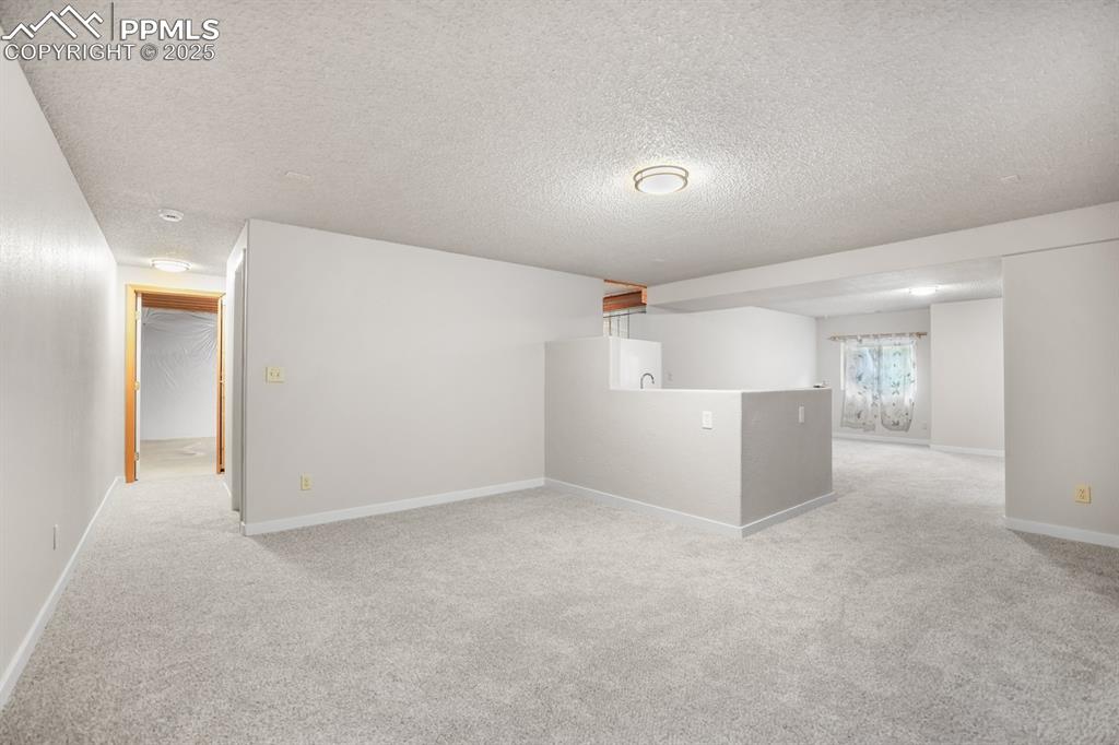 Image 32 of 44: Basement Family Room