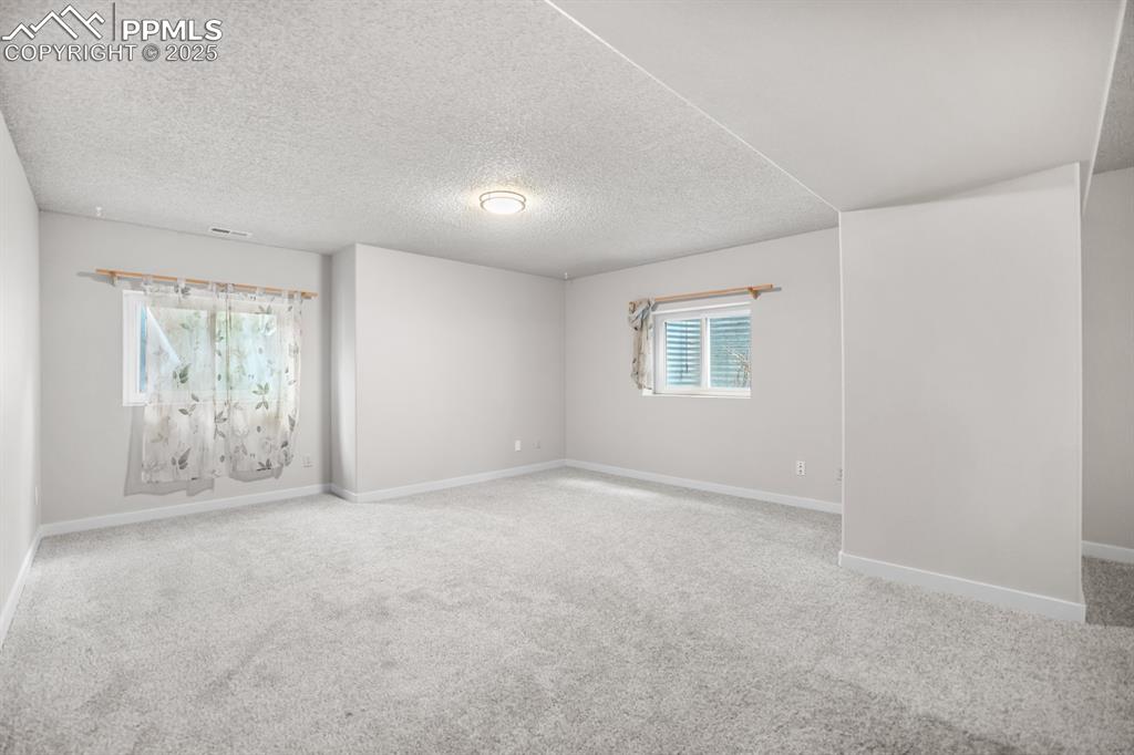 Image 33 of 44: Basement Living Room