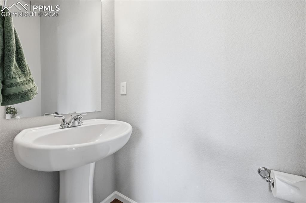 Image 13 of 24: Half bath on main floor