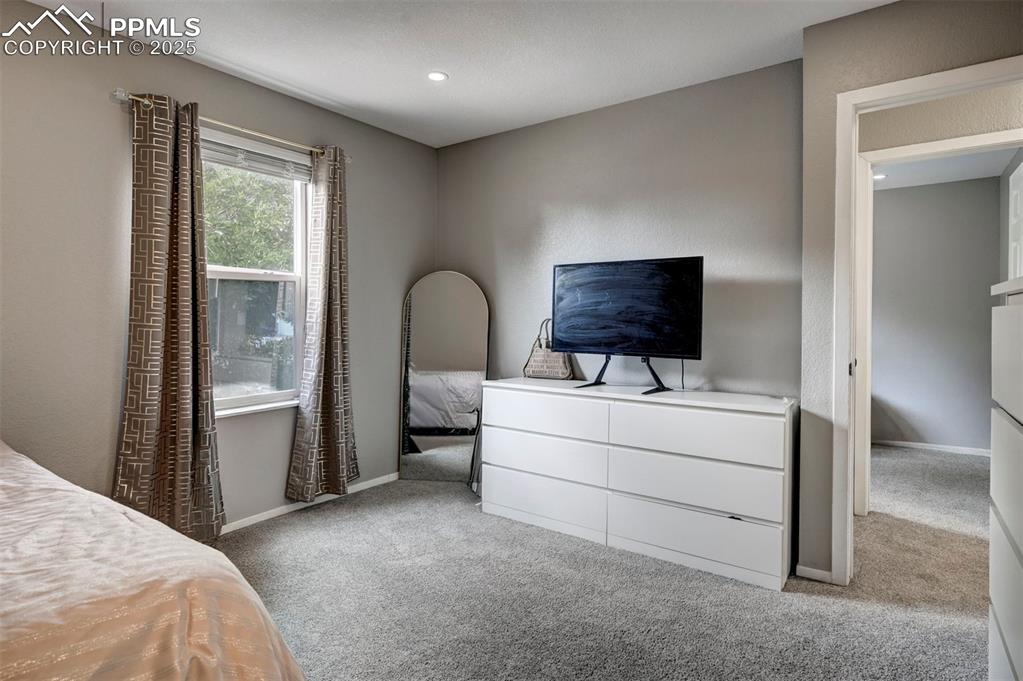 Image 13 of 33: Bedroom featuring carpet floors and recessed lighting