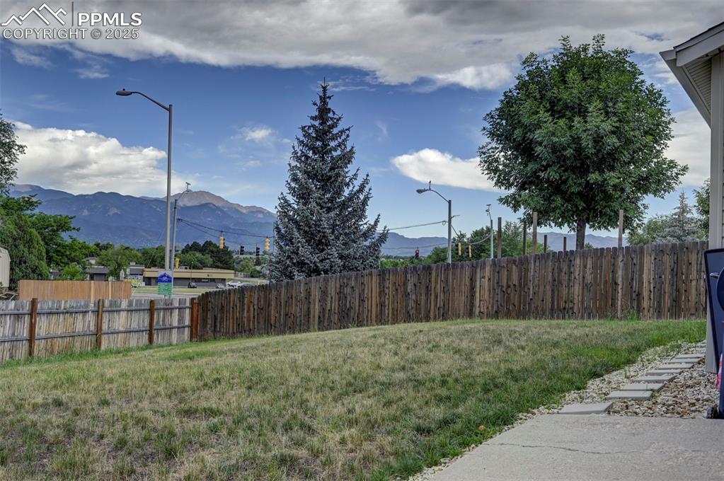 Image 28 of 33: View of yard with a mountain view