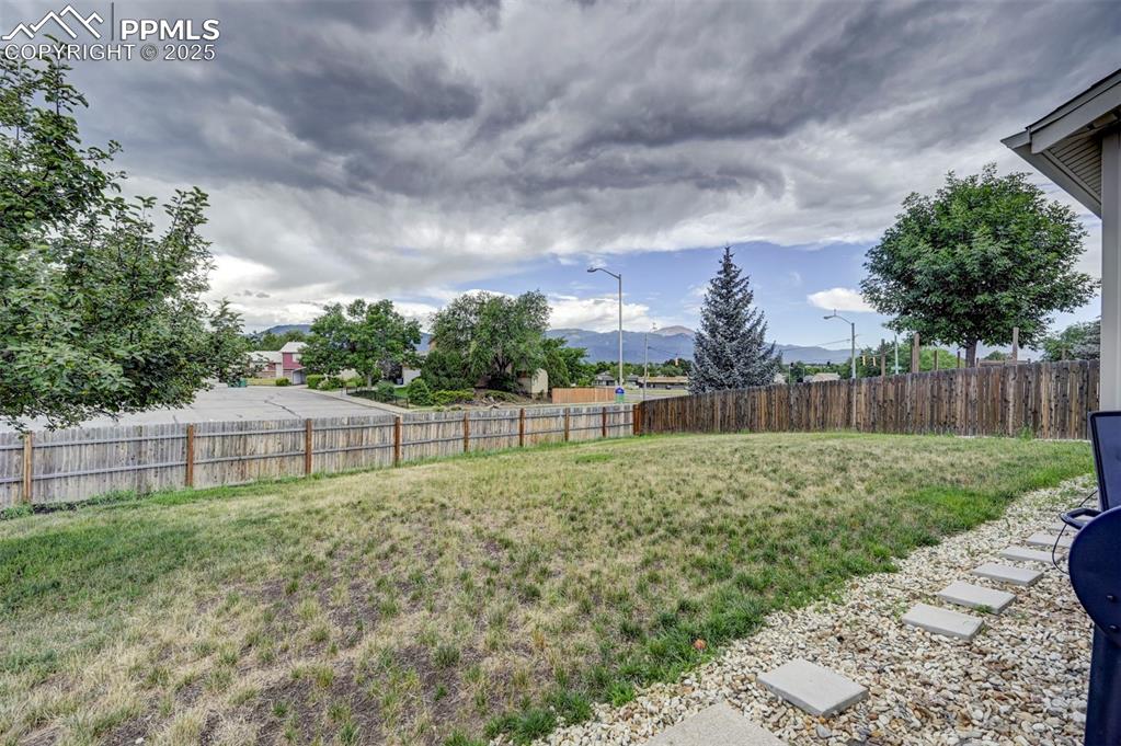 Image 32 of 33: View of yard featuring a mountain view
