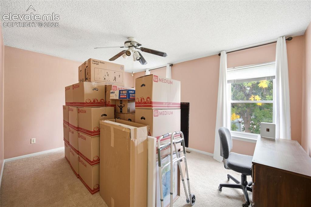 Image 29 of 47: Upper level bedroom - getting ready for the move.