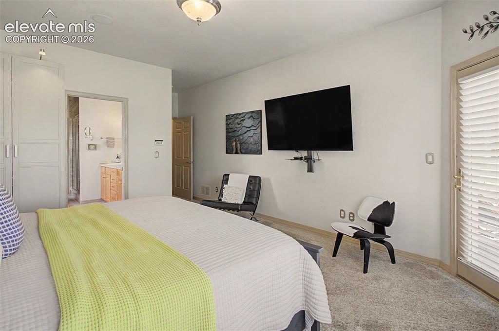 Image 20 of 50: Master Bedroom