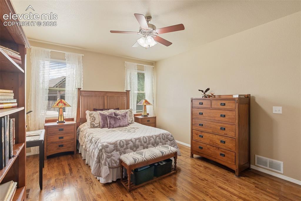 Image 10 of 39: Main level primary bedroom