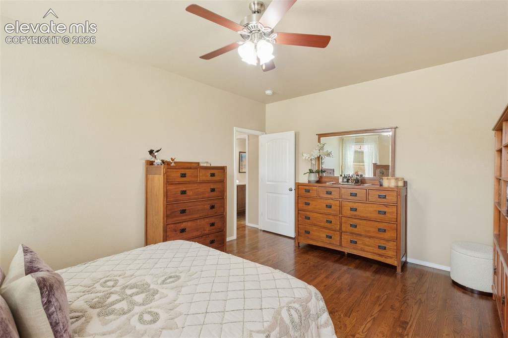 Image 12 of 39: Main level primary bedroom