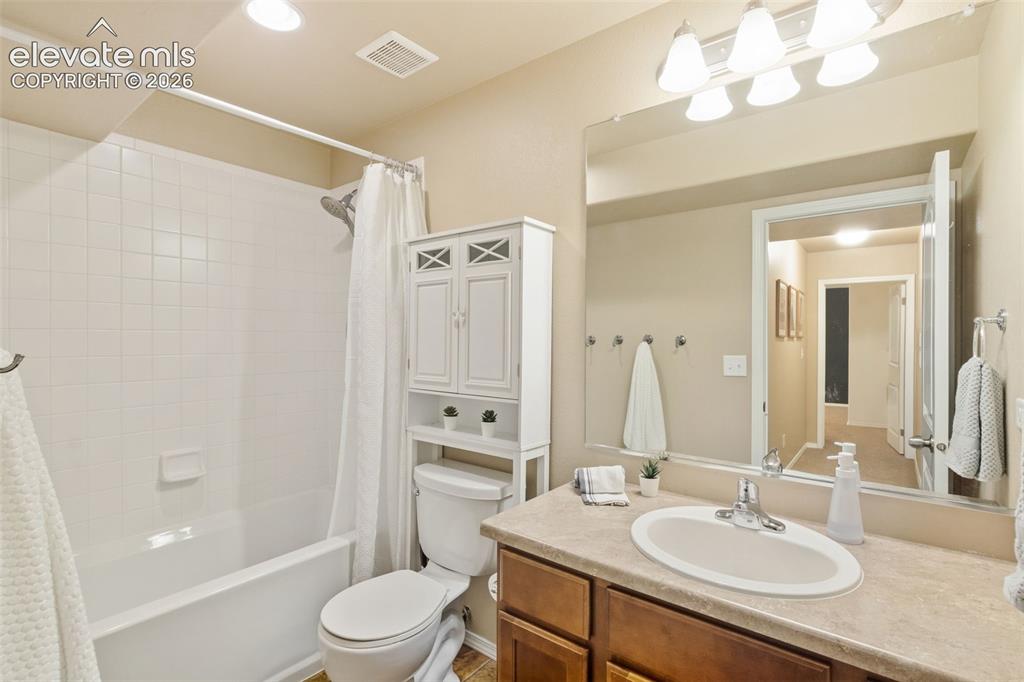 Image 16 of 39: Main level bathroom 2